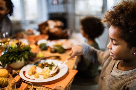 Black Family Christmas Dinner Stock Photos, Pictures & Royalty-Free ...