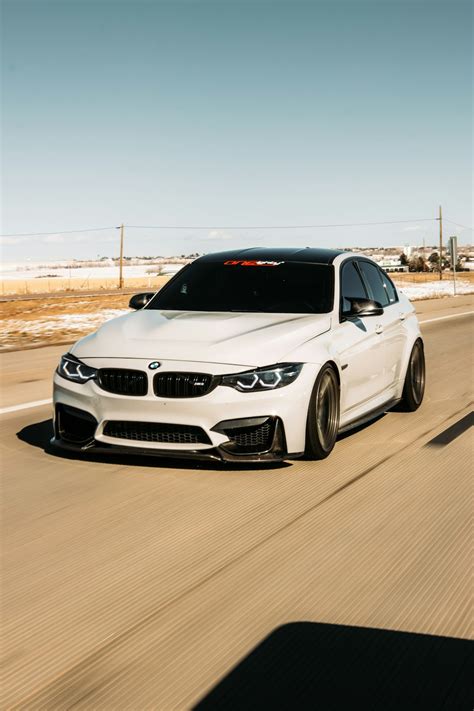 White Bmw M 3 On Road During Daytime Photo Free Grey Image On Unsplash