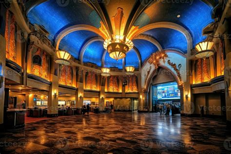 An establishing shot of a bustling movie theater lobby. 26804917 Stock ...