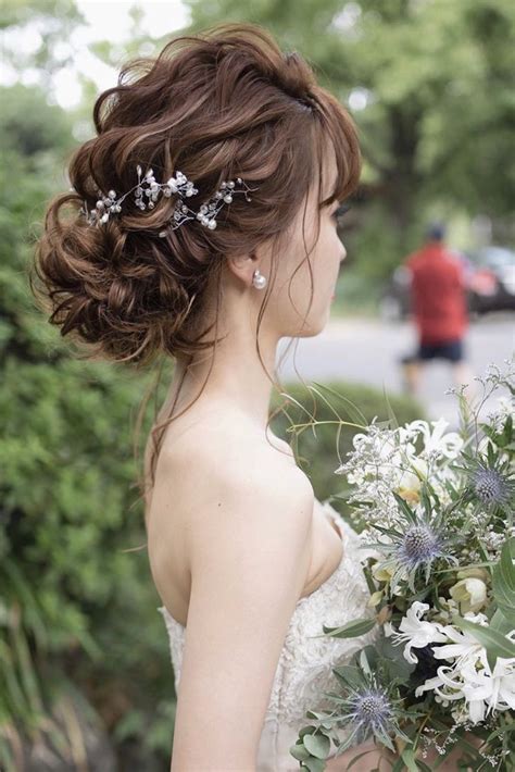 花嫁ヘアふわふわラフシニヨン ウェディング ヘアスタイル シニヨン 花嫁 ヘア