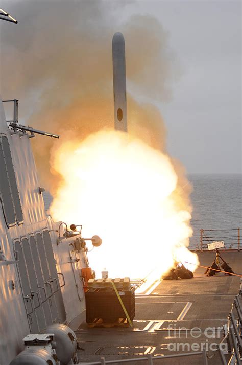 A Tomahawk Missile Launch Aboard Uss Photograph by Stocktrek Images - Fine Art America