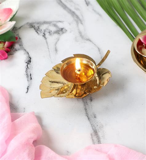 Buy Lotus Gold Brass Diya At 6 Off By Amaya Decors Pepperfry