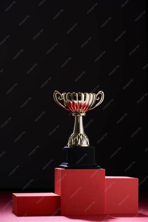 Premium Photo | Close up trophy on the black background