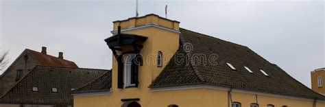 Yellow House with Tiled Roof Stock Image - Image of street, urban ...