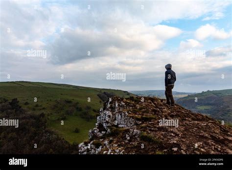 Climbing up in the mount on the morning in the Peak District, Thor Cave ...