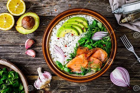 Salmon Salad Smoked Salmon White Rice Avocado And Green Vegetables On Wooden Table Top View