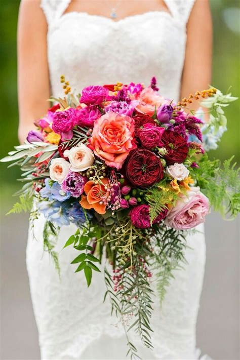 A Wonderful Bridal Bouquet In A Rainbow Jewel Tone Color Palette