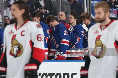 Nick Holden And Brady Skjei Of The New York Rangers Look On During