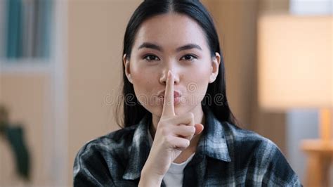 Portrait Asian Ethnic Korean Woman Point With Finger Near Mouth Chinese