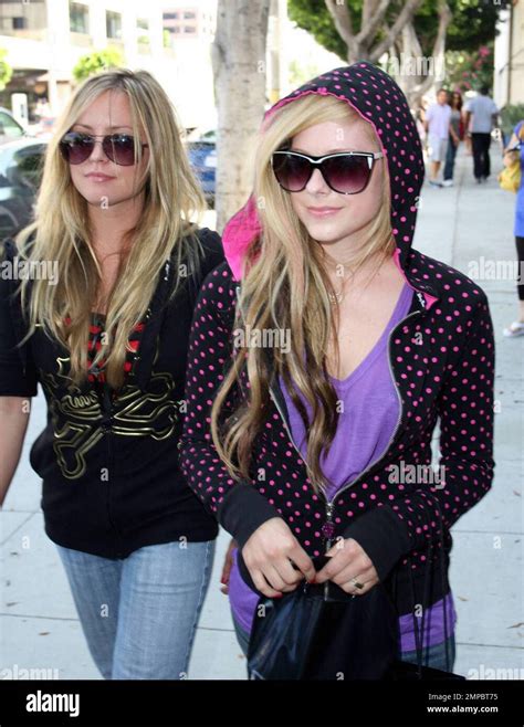 Avril Lavigne And A Female Friend Shop At Chanel In Beverly Hills Ca