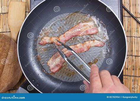 Chef Frying Bacon In The Pan Stock Photo Image Of Cook Color 85702954