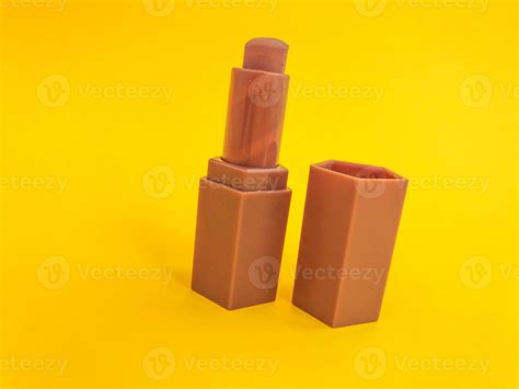 Matte Lipstick On A Yellow Matte Background Beige Lipstick Soft Brown Tint Nude Lip Makeup