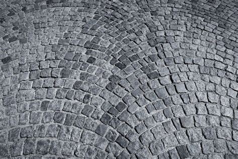 Patterned paving tiles stock photo. Image of ground, pave - 64495694