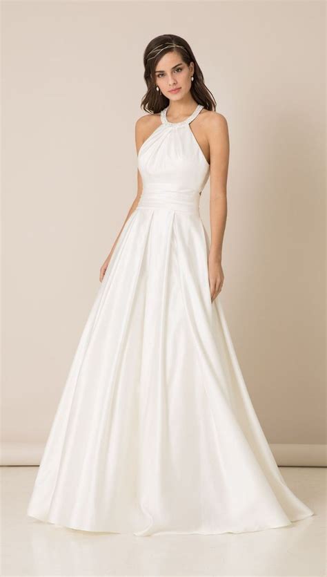 This Satin Ballgown Works Wonderfully With A Subtle Halter Neck To