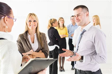 Business people discussing 14229574 Stock Photo at Vecteezy