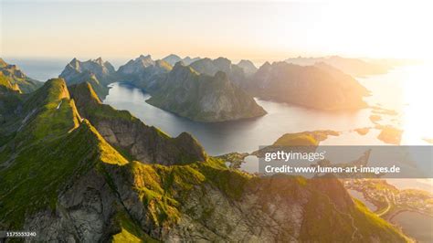 Sunrise At Reinebringen Mountain In Lofoten Islands High-Res Stock ...