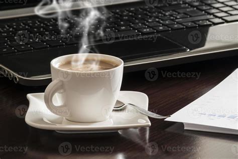 Coffee and laptop 832719 Stock Photo at Vecteezy