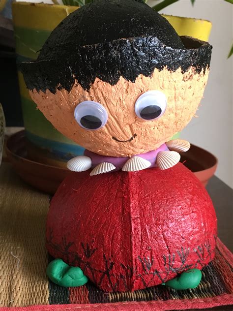 Doll created using coconut shell. | Coconut shell crafts, Shell crafts ...