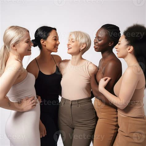 Women Of Different Ages Together In The Studio On A Gray Background