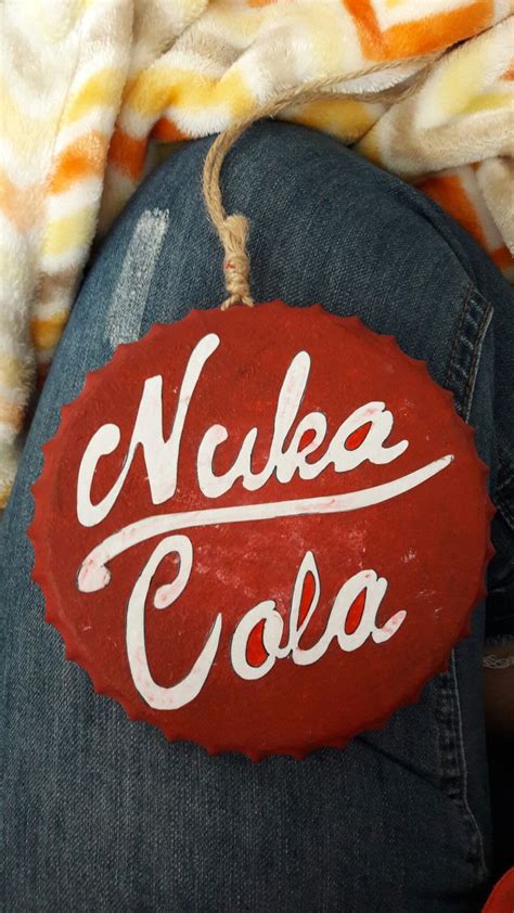 DIY Nuka cola bottle cap wall art | Bottle cap wall art, Nuka cola ...