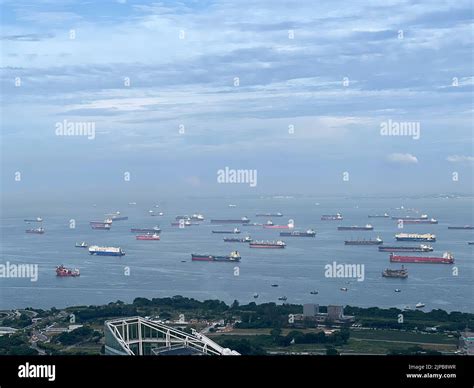 An Aerial View Of Ships And The Coast Of The Singapore Strait Stock