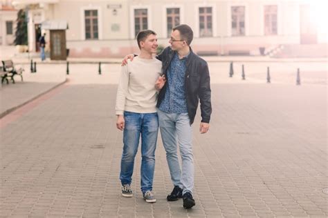 Premium Photo Cute Gay Couple In The City Tender Gentle Kissing Smiling