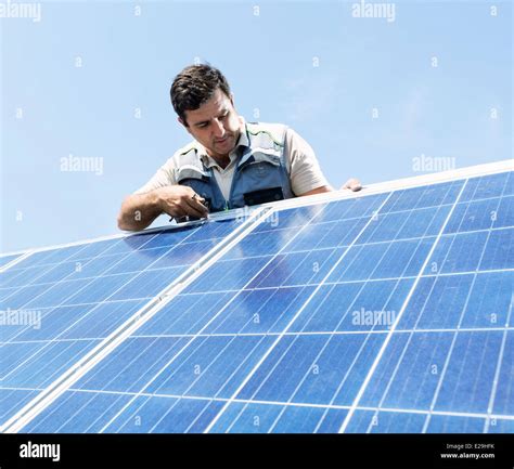 Installing Solar Panel Hi Res Stock Photography And Images Alamy