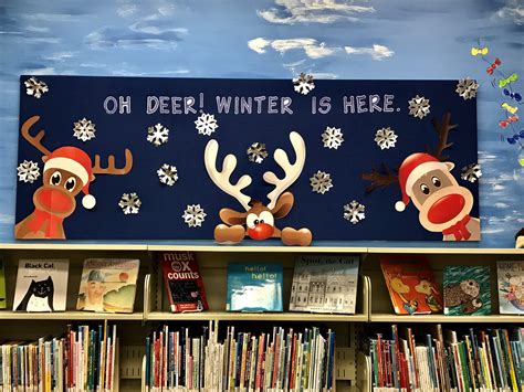 Winter-themed library bulletin board. "Oh deer! Winter is here ...