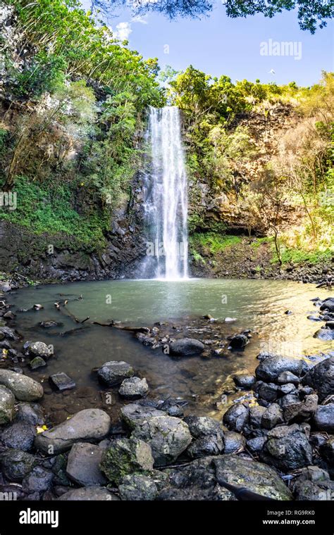 Waterfall Into A Pool Secret Falls Wailua River Kauai Stock Photo