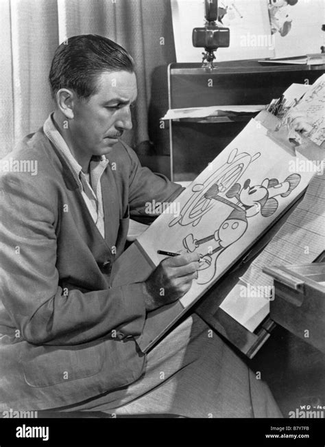 American animator and producer Walt Disney drawing Mickey Mouse ...