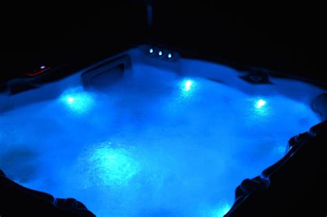 View on a spa at night, Hot tub at night 8357849 Stock Photo at Vecteezy