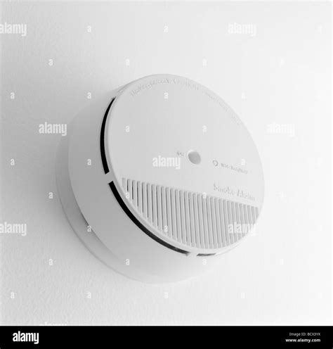 A Smoke Detector Mounted On A Wall Stock Photo Alamy