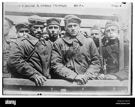 US soldiers & German prisoners Stock Photo - Alamy