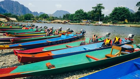 Traditional Long Tail Boats In Nam Song River At Vang Vieng Laos