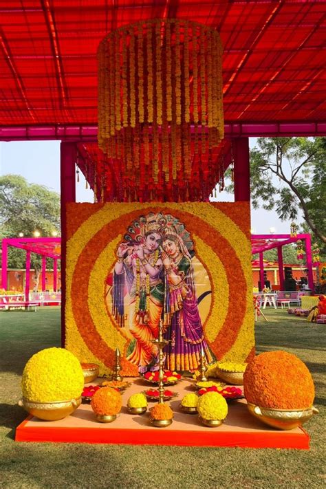 an outdoor stage decorated with flowers and decorations for gandapaa ...