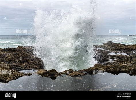 A Wave Crashing Out Of Thor S Well In Cape Perpetua Rocky Headland