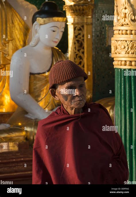 Monk Praying In The Shwedagon Pagoda Or Shwedagon Zedi Daw Yangon