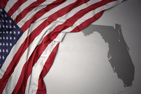 Waving National Flag Of United States Of America On A Gray Florida