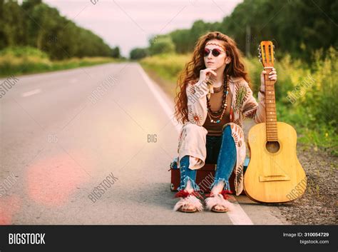 Hippie Girl With Guitar