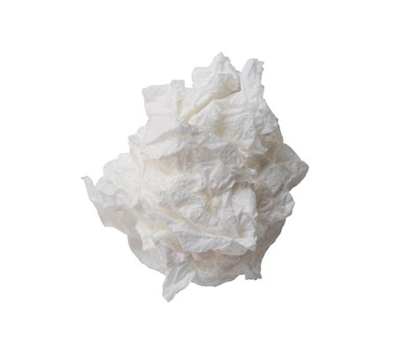 Single White Screwed Or Crumpled Tissue Paper Or Napkin In Strange