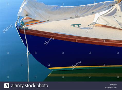 Sailboat Bow On Mooring In Calm Water Stock Photo Alamy