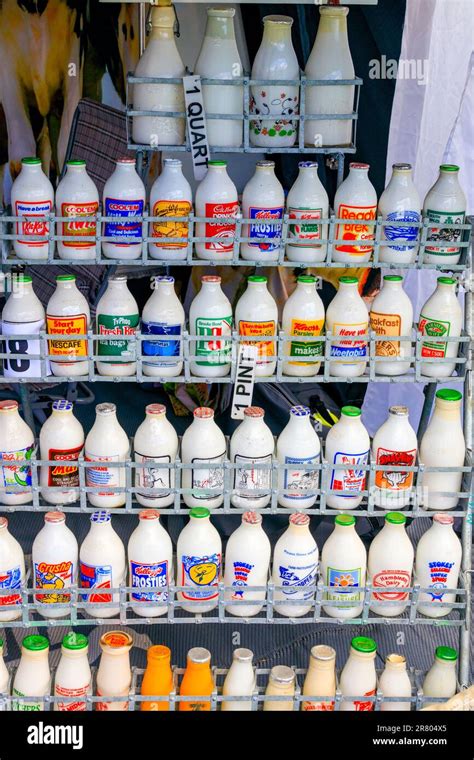 A Display Of Milk Bottles Bearing Advertisements At Abbey Hill Steam Rally Yeovil Somerset