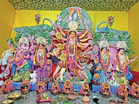 Devotees Engrossed In The Worship Of Maa Durga Worshiped In The Court