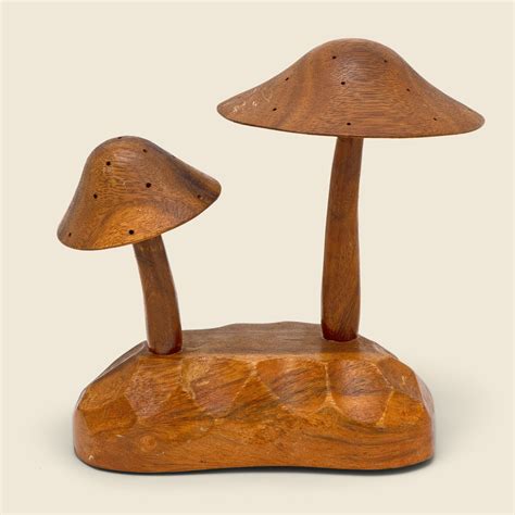 Art Critics Debate The Wooden Mushroom Sculpture Trend - RYZE Superfoods