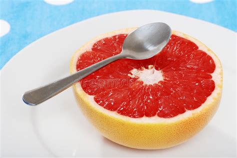 Grapefruit With A Spoon Stock Photo Image Of Color Grapefruit 11924794