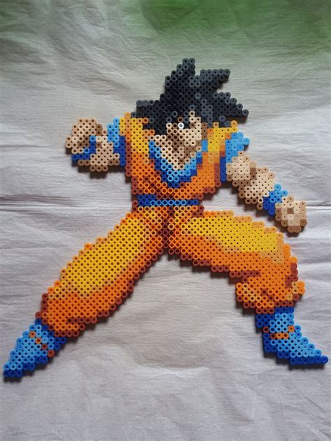 Goku Perler Beads By Shinigamigrl On Deviantart Perler Perler Beads Images And Photos Finder