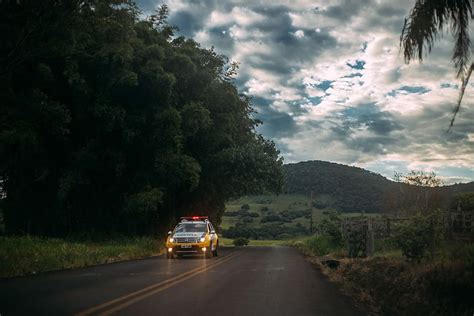 HD Wallpaper Road With Police Car In The Landscape Clouds Cop