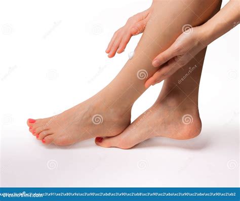 Belles Jambes Minces Femelles D Isolement Sur Le Fond Blanc Image Stock