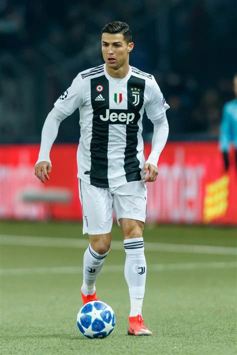 BERN, SWITZERLAND - DECEMBER 12: Cristiano Ronaldo of Juventus controls the ball during the UEFA ...