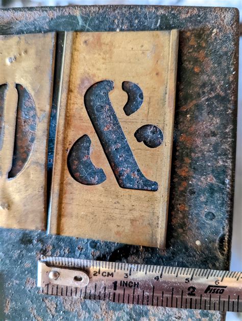 Brass interlocking letter stencils – Salvage Hound